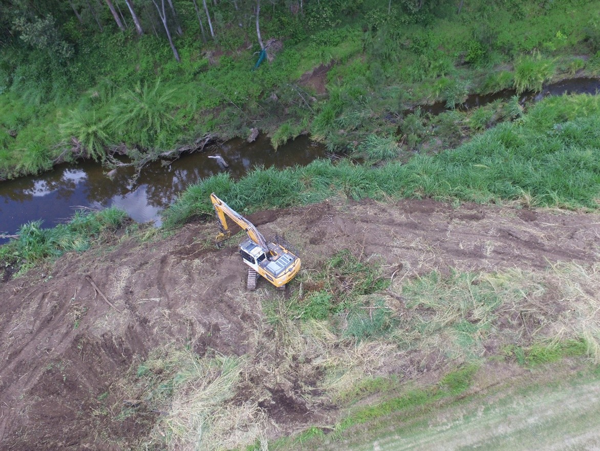 Excavator on Laidely Creek riverbank