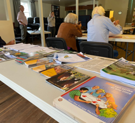 workshop printed materials spread on a table