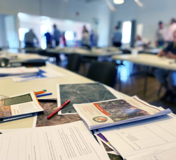 workshop support materials spread on a table